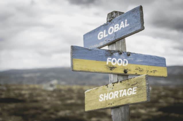 A sign with the words Global Food Shortage.