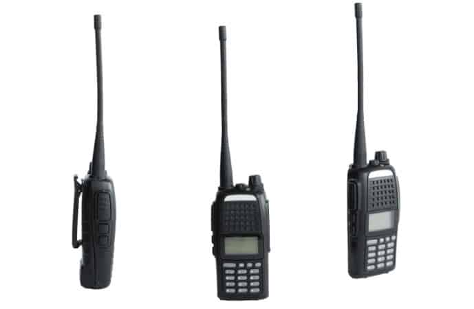 Three walkie talkies in a white background.